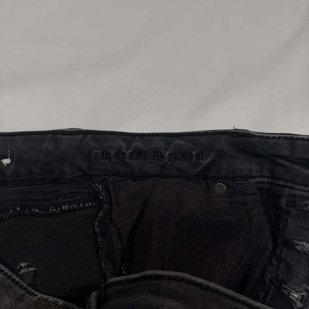 American Eagle Super Hi-Rise Next Level Stretch Black Distressed Button-Fly Shor - Picture 6 of 7
